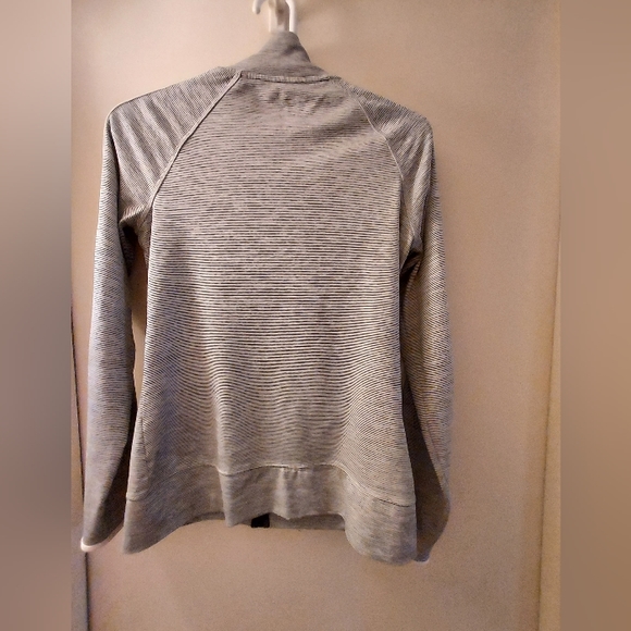 Women's x-small zip up lightweight athletic wear jacket. White with blue strips - Picture 5 of 6